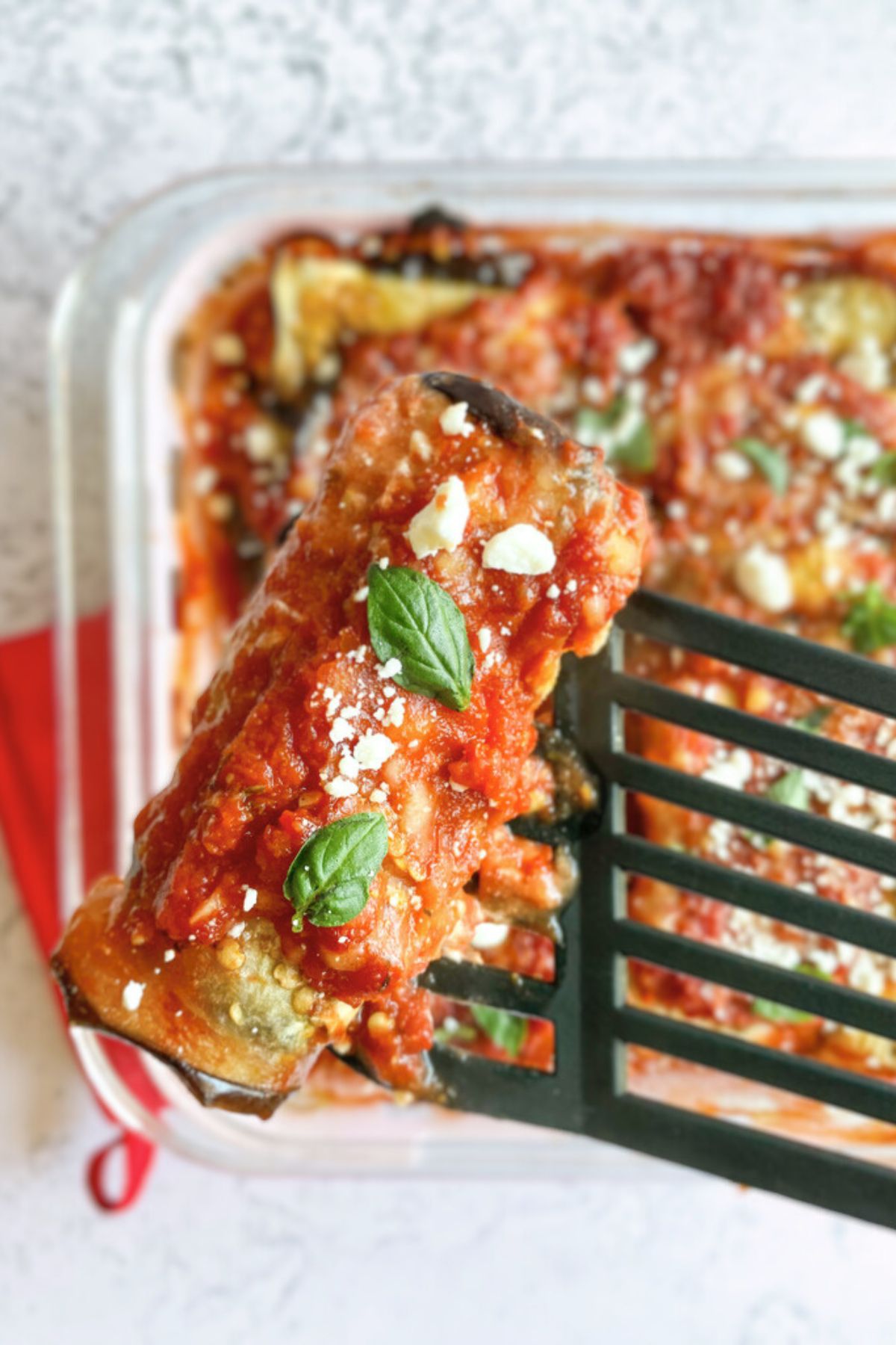 Spatula with light eggplant rollatini.