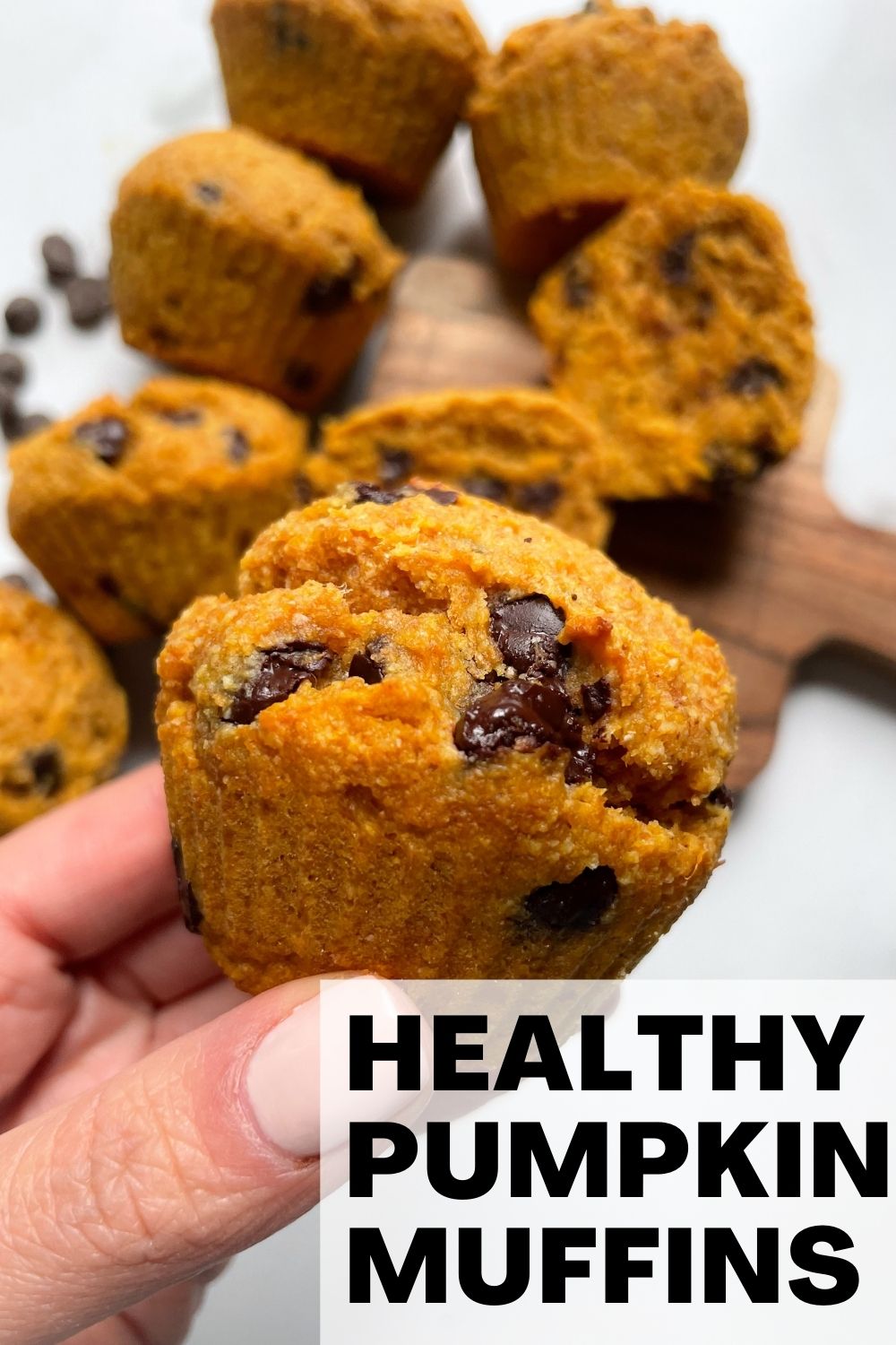 hand holding pumpkin muffin