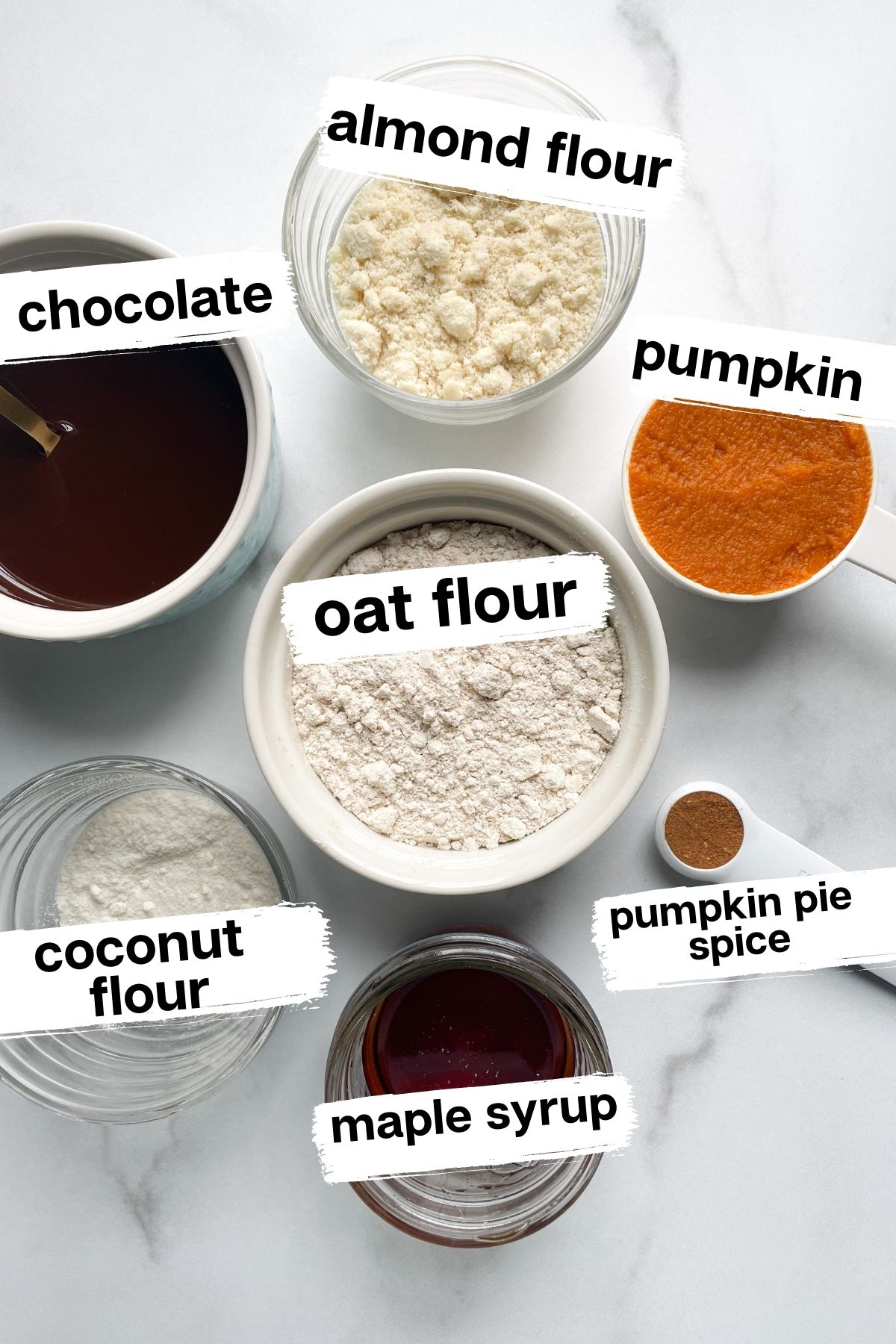 ingredients in bowls for pumpkin spice truffles