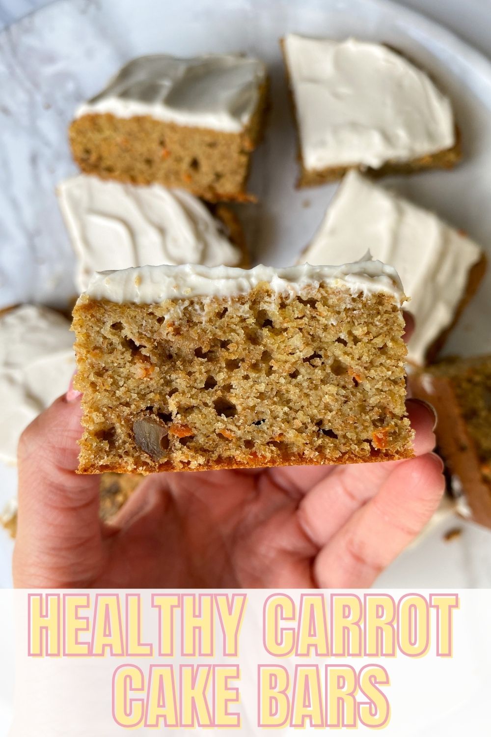 hand holding carrot cake bar