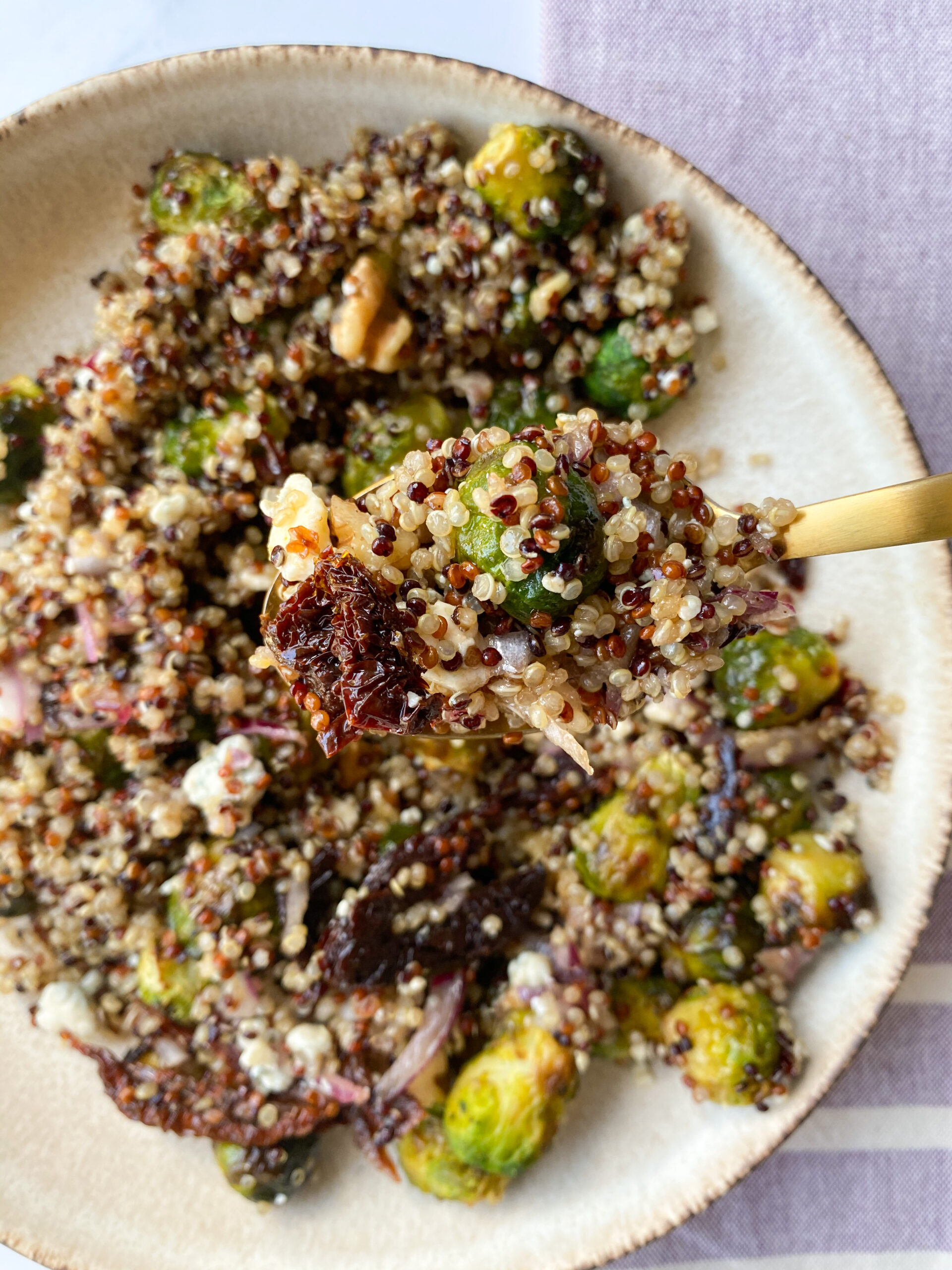 Easy Brussel Sprout Quinoa Salad with SunDried Tomatoes, Walnuts and