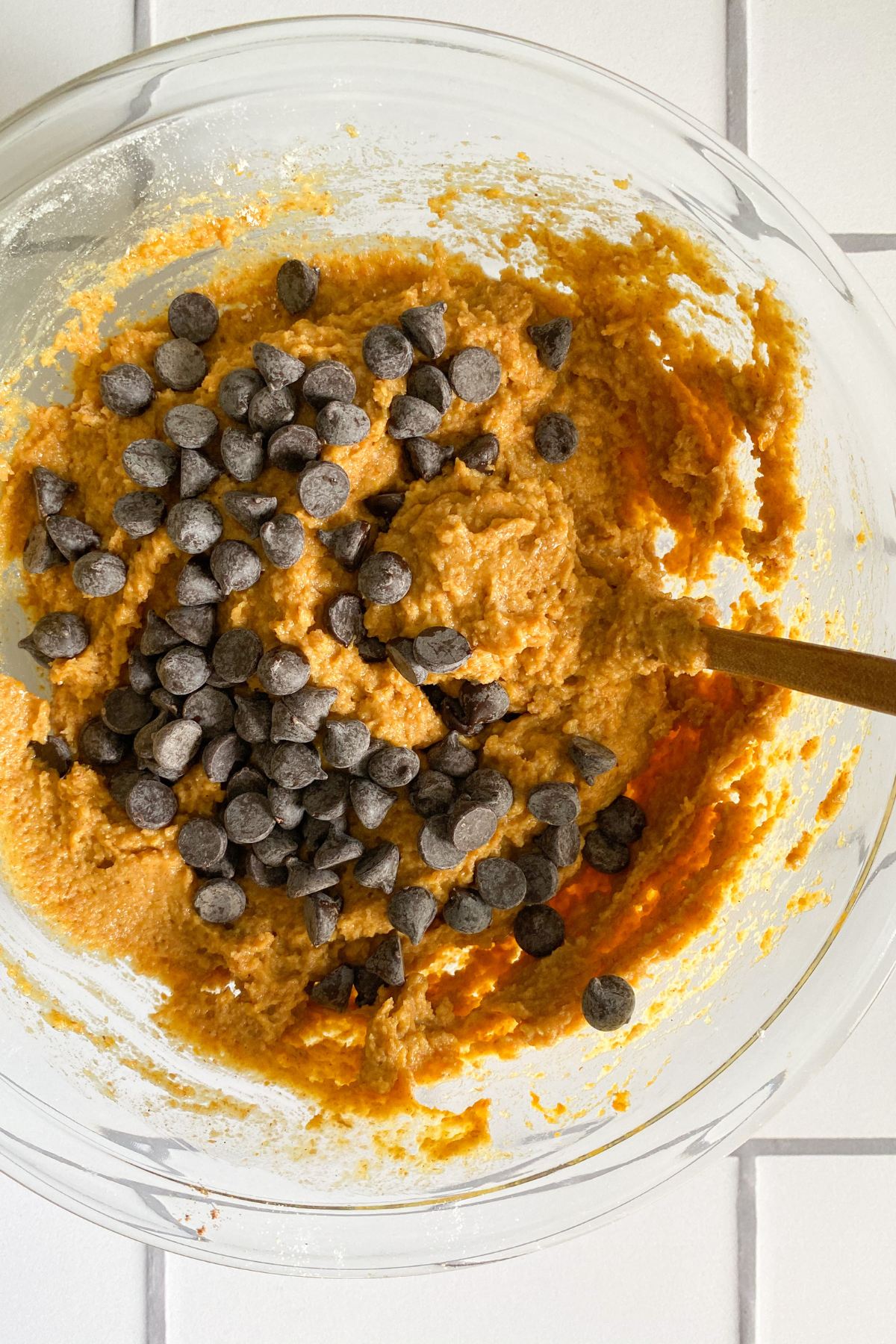 pumpkin bread batter in bowl with spoon