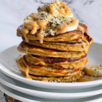 stack of pancakes with toppings