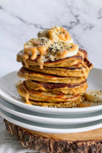 stack of pancakes with toppings