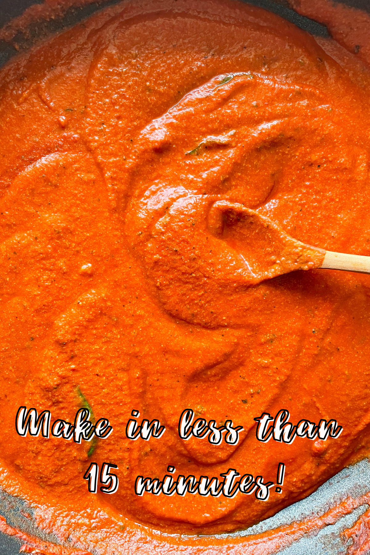 creamy vegan pasta sauce in pan with spoon