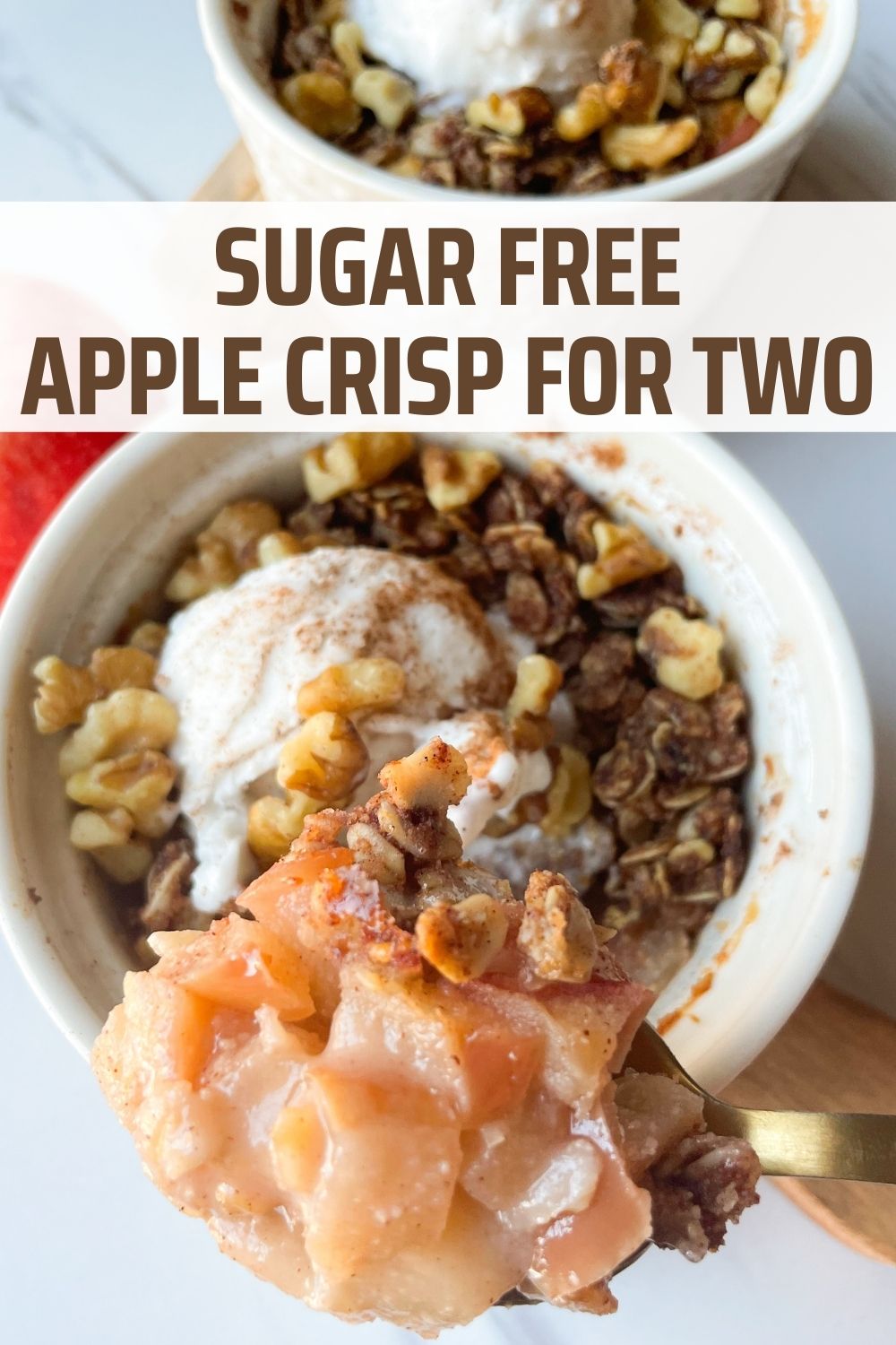 ramekins with apple crisp and gold spoon