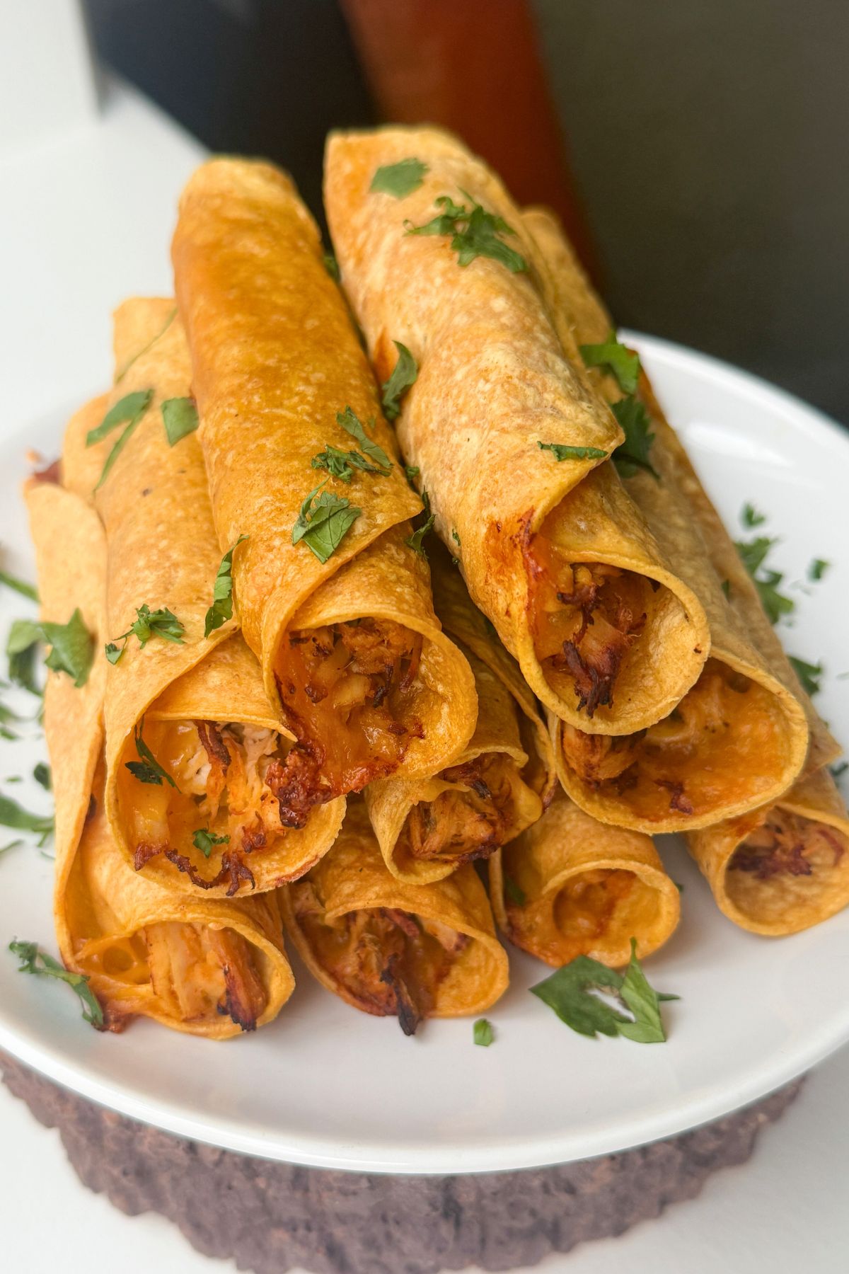 Stacked air fryer chicken taquitos