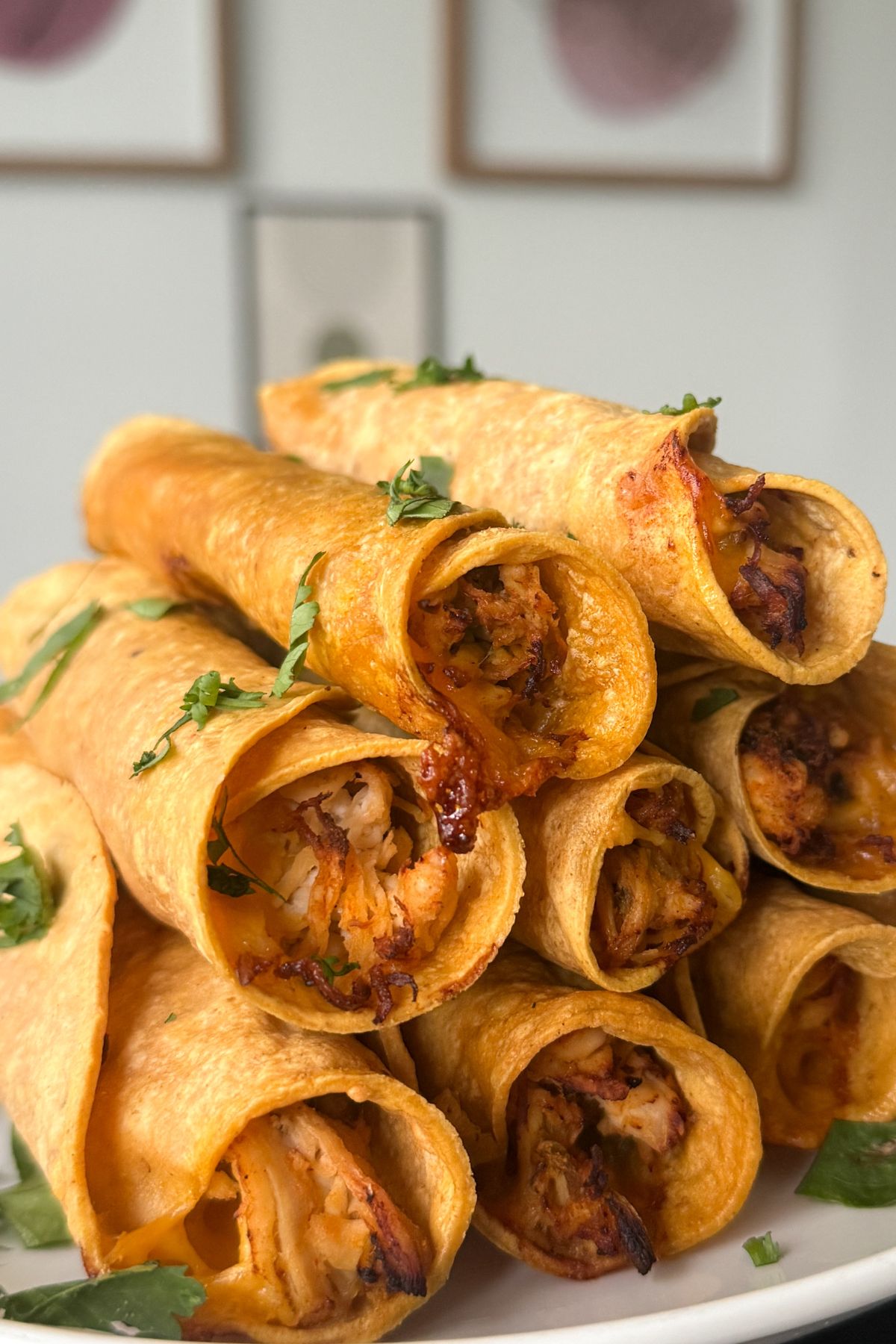 Stacked air fryer chicken taquitos