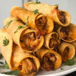 Stacked air fryer chicken taquitos
