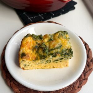 A slice of cottage cheese egg bake on a plate.